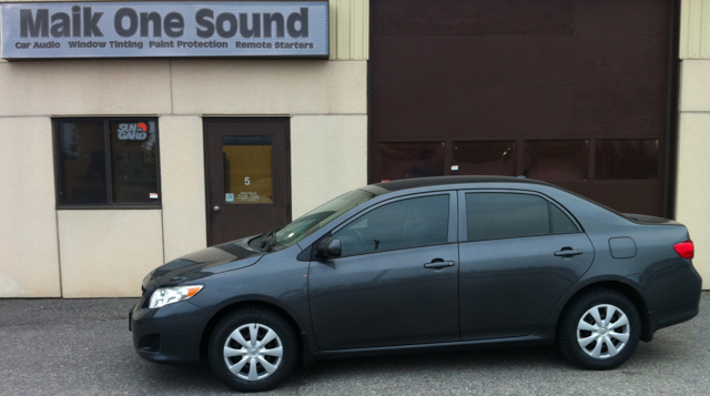 Toyota Corolla 2011 with professional window tint in North Bay